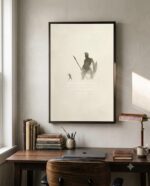 David and Goliath art print in a dark walnut frame above a wooden desk, muted Psalm 144:1 biblical wall art in a home office with a brass lamp and vintage books.