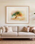 Garden of Gethsemane fine art print above a cream linen sofa in a living room, shown white-matted in a light oak frame - frame not included